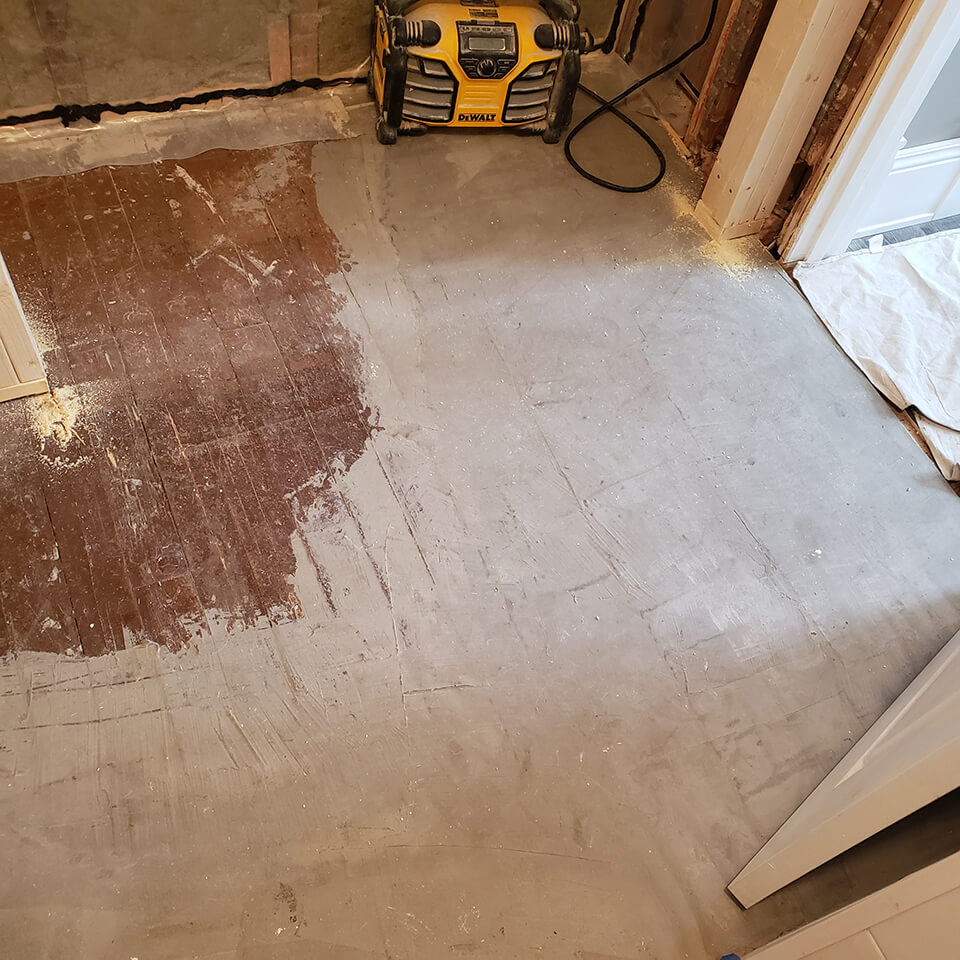 leveling floor concrete Bathroom Powder Room - Bathroom Renovations Winnipeg - All Canadian Renovations Ltd.