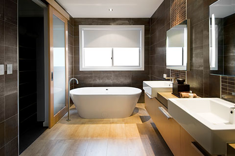 beatiful modern dark bathroom dual sinks free standing tub addtition renovation