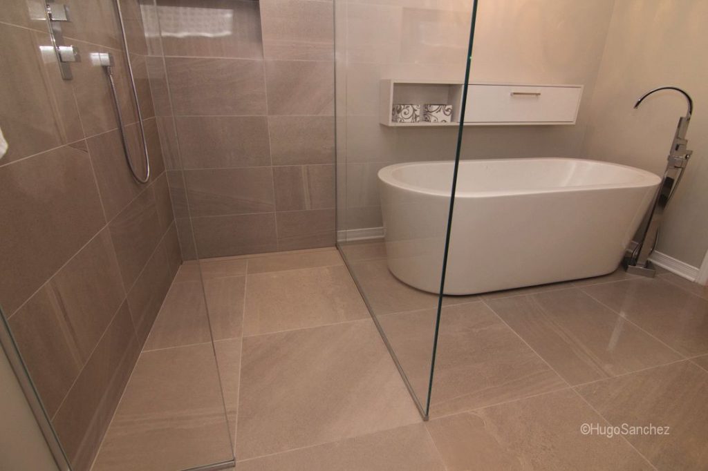open curbless bathroom walk-in shower modern washroom beige tile