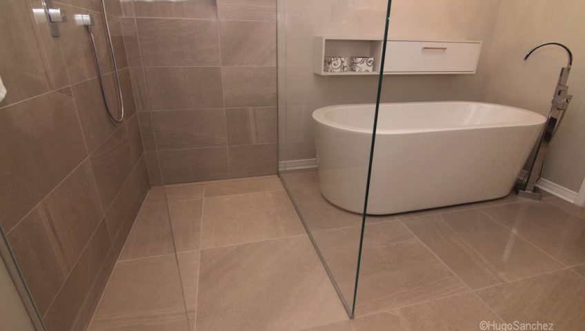 open curbless bathroom walk-in shower modern washroom beige tile