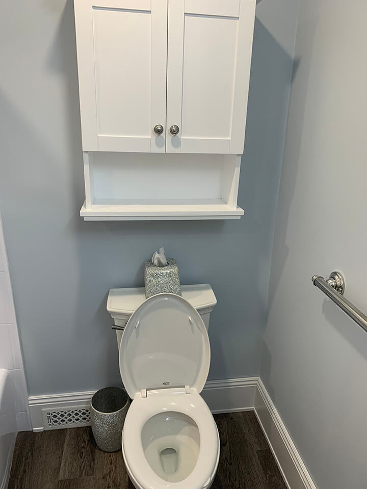 toilet and storage small Bathroom Powder Room - Bathroom Renovations Winnipeg - All Canadian Renovations Ltd.