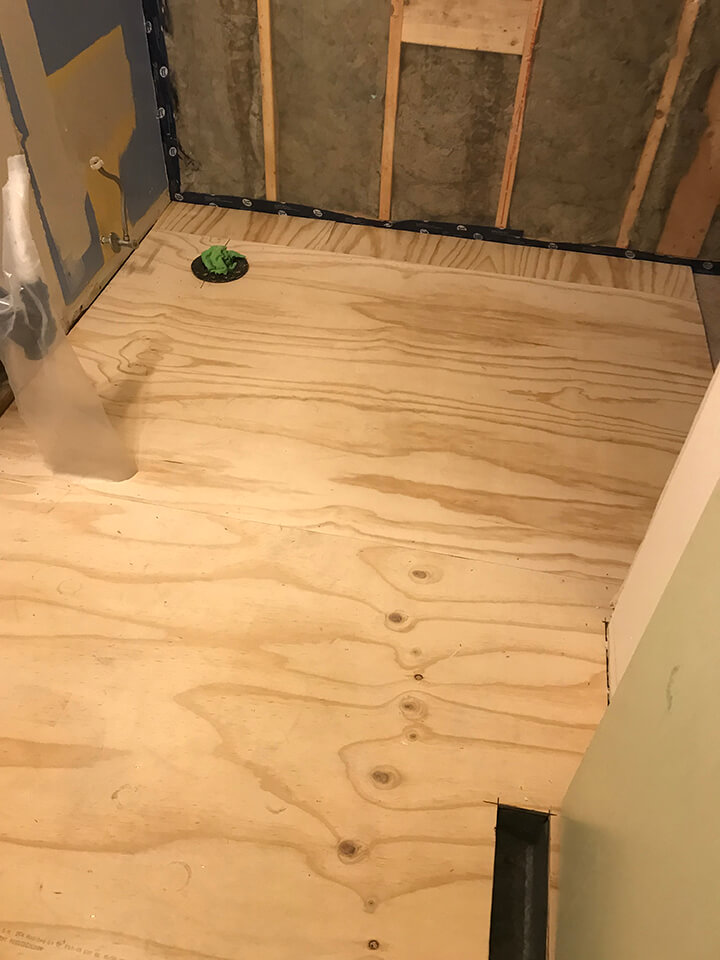 new flooring for a Bathroom Renovation - Winnipeg Bathroom Renovations - All Canadian Renovations Ltd.